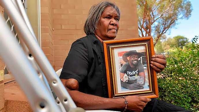 Therese Ryder with a portrait of her son Kwementyaye.